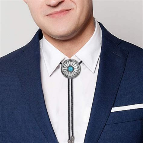 wearing a bolo tie.